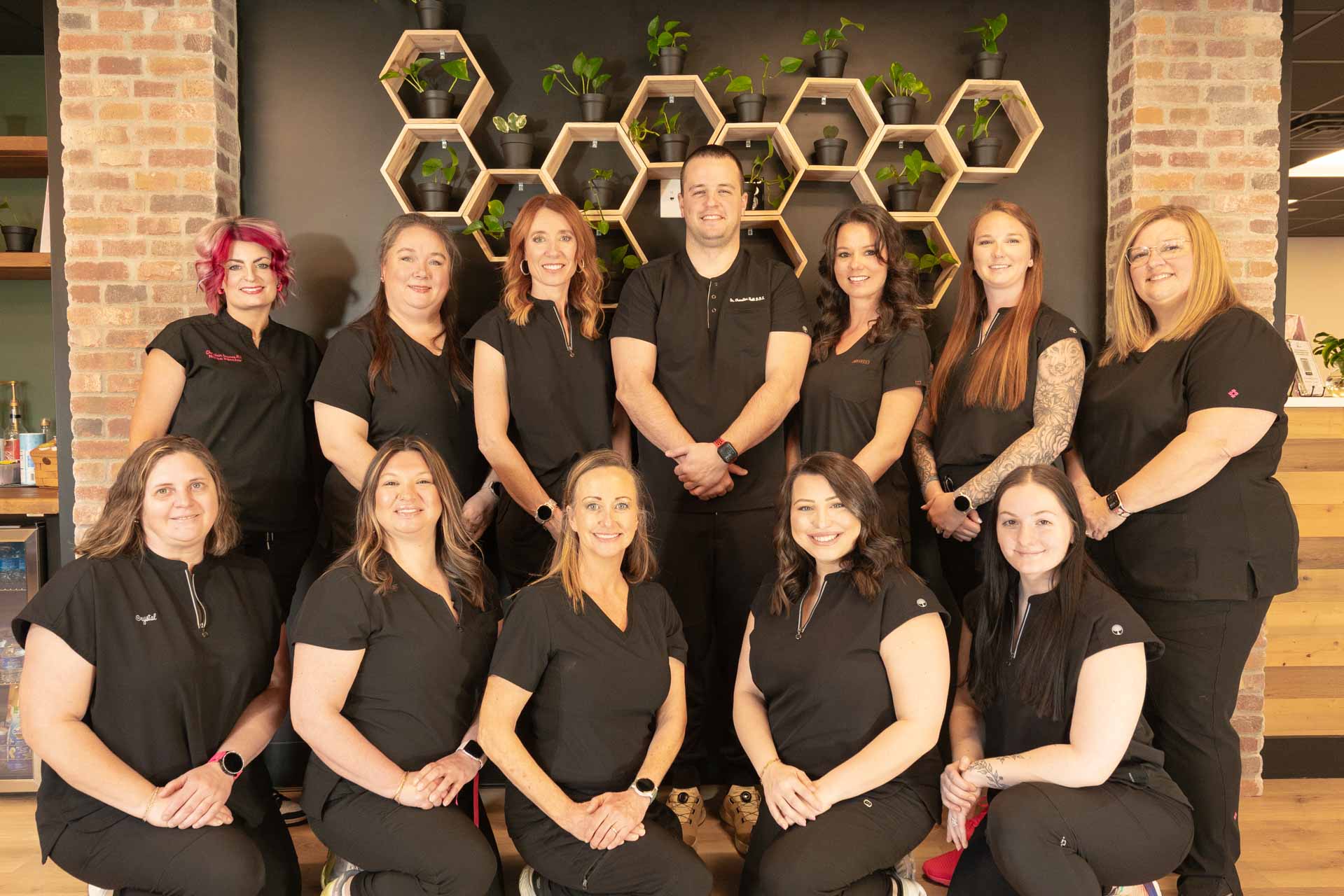 Branson Family Dentistry staff group photo at their new clinic location at 405 Veteran's Blvd. Suite 100.
